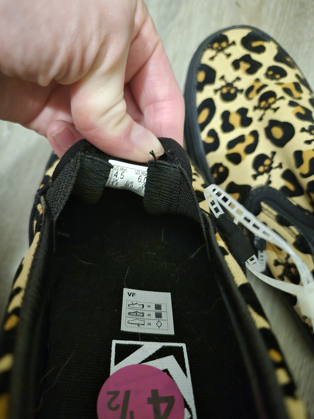 Vans Leopard Print Slip-On Sneakers in Black and Tan - Picture 2 of 2